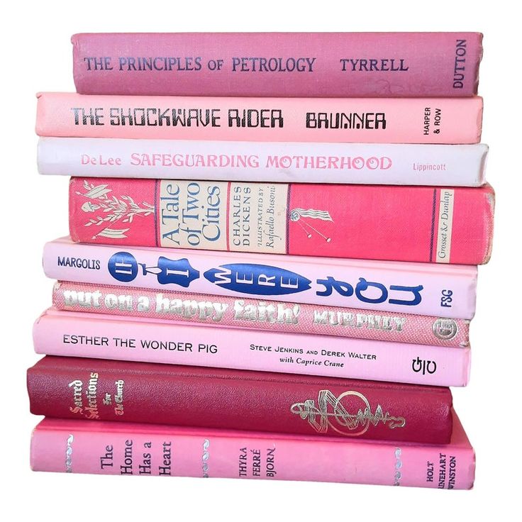 a stack of books sitting on top of each other in front of a white background