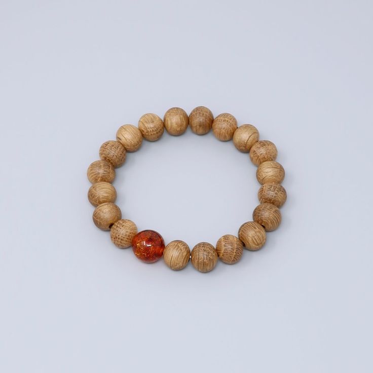 Japanese whiskey wood white oak wood bracelet bracelet Characteristics of the product Material : whiskey wood(oak wood) , Amber Wrist size : 17cm/15cm Main beads : about 11mm/8mm About whiskey wood A unisex bracelet that can be worn as a talisman to ward off evil or fulfill wishes.It is a simple bracelet that uses only whiskey wood, giving you a sense of the history of barrels that have grown whiskey for many years.The rubber is made of four layers of elastic and durable silicone rubber.This is Japanese Whiskey, Japanese Whisky, Kumihimo Bracelets, White Oak Wood, Traditional Ceramics, Wood Bracelet, Amber Bracelet, Simple Bracelets, Unisex Bracelets