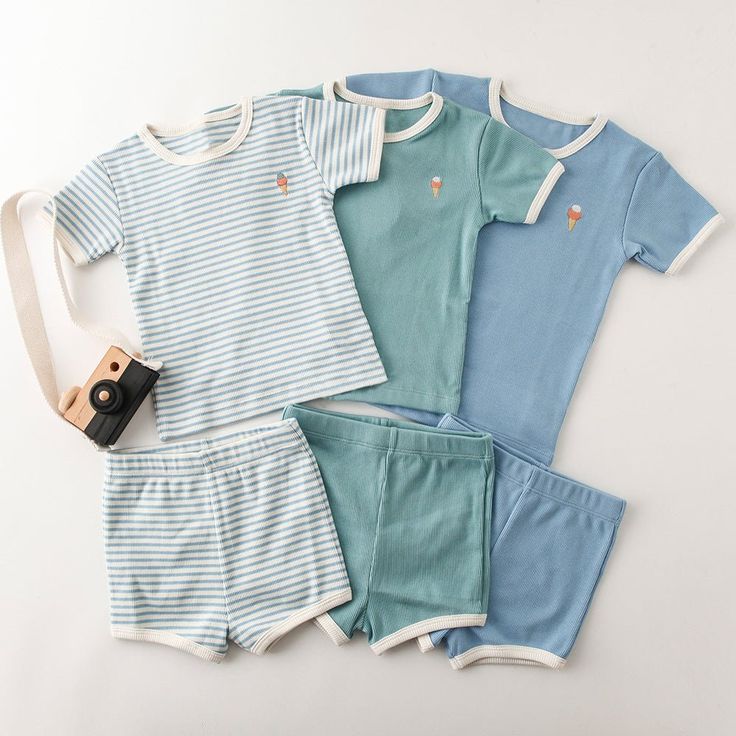 Looking for a cute outfit to wear this summer? This Baby/Toddler's Embroidery Ice Cream Print T-shirt and Shorts is perfect for any occasion. The material is soft cotton, which will keep your little one comfortable all day long. The fit is normal size, so it should be easy to find clothes that will fit them too. Brand Name: Kidsyard GreenlandMaterial: 100% Premium COTTONGender: UnisexFit: Normal Size FitSleeve Length: ShortsleeveInclude: T-shirt/Shorts/SetMachine wash, tumble dryImported Playful Cotton Bottoms In Matching Set, Playful Cotton Short Set For Summer, Summer Cotton T-shirt For Playwear, Blue Cotton Family Matching Sets, Cute Short Sleeve Set For Spring, Cute Short Sleeve Short Set For Spring, Playful Short Cotton Tops, Blue Cotton Short Set For Summer, Cotton Summer T-shirt For Playwear