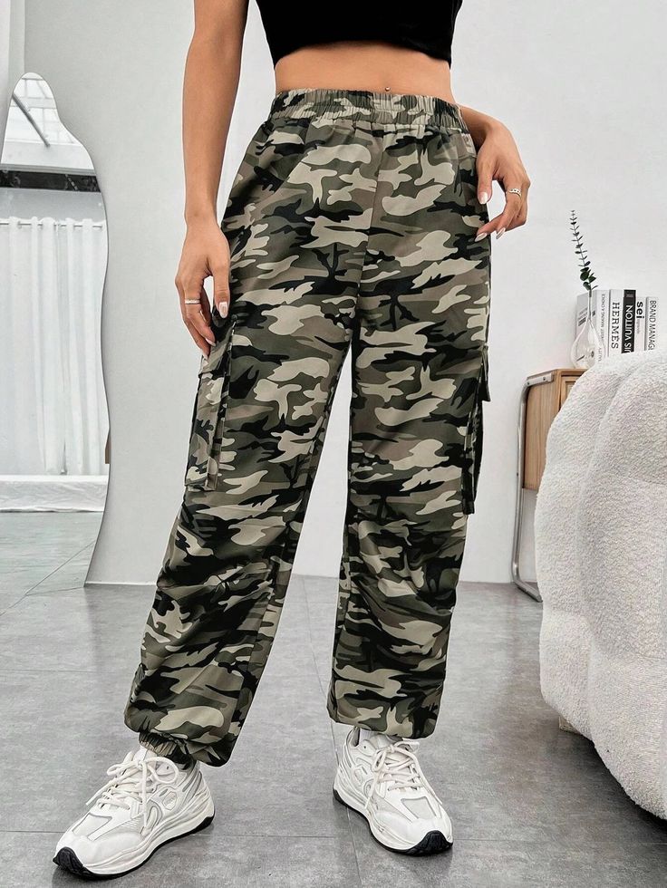 Make a bold fashion statement with our Camo Casual Printed Cargo Pants! Crafted from durable woven fabric and featuring a zipper fly, these unique pants are sure to turn heads. Perfect for outdoor adventures or everyday fun, you can finally let your personality shine. And blend into the background too as an added bonus. Details: Style: Casual Pattern Type: Camo Type: Cargo Pants Closure Type: Zipper Fly Waist Line: Natural Length: Long Fit Type: Regular Fit Fabric: Non-Stretch Material: Woven Bo Spring Combat Pants With Pockets, Stretch Camouflage Bottoms With Pockets, Spring Cotton Combat Cargo Pants, Spring Combat Cotton Cargo Pants, Spring Combat Cargo Pants, Spring Combat Cotton Pants, Trendy Summer Cargo Pants For Outdoor, Casual Camouflage Cotton Cargo Pants, Cotton Trousers For Outdoor Activities