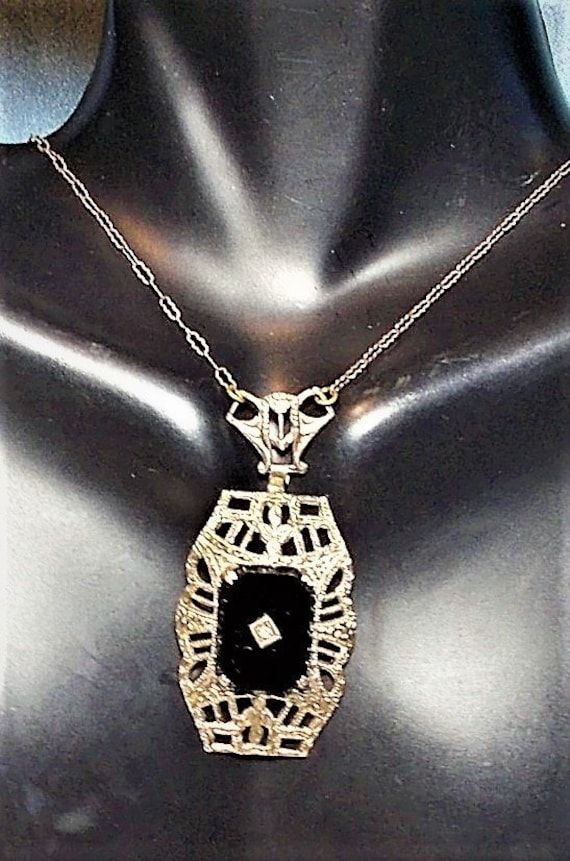 "REDUCED FROM $279.90. 1920s Edwardian Onyx Necklace w/ DIAMOND in Point Marked Sterling Filigree Etched FLORALOpen Work Art Deco Black 17\" Rhodium Paper Clip Necklace. The black onyx smooth clear & shiny (see the reflections on front & on back. Set in Edwardian Sterling marked on Pendant & clasp. Beautiful ornate antique Lavalier necklace only 16\", If you would like, I can add similar not identical paper clip chain for $8.00 an inch just email me. Other items in final pictures, I Art Deco Jewelry For Vintage Events, Victorian Hallmarked Necklace For Evening, Victorian Evening Necklace With Hallmark, Formal Black Engraved Necklace, Black Engraved Necklace For Wedding, Victorian Silver Necklace For Vintage Events, Art Deco Silver Jewelry For Evening, Silver Art Deco Jewelry For Evening, Antique Silver Victorian Necklace For Formal Occasions