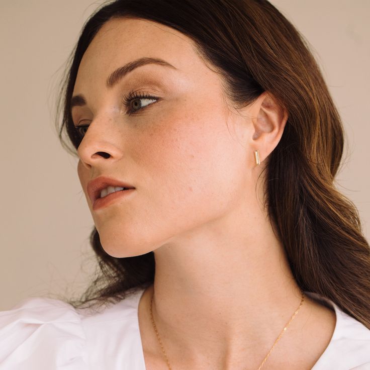 Minimal in design, but feminine in material, the Mother of Pearl Zoe earrings are sure to be a regular in your rotation. Available in 14k gold plated brass Size: 7/16" 9.5mm x 1.5mm Mother of Pearl inlay Stainless steel post with friction back SKU: BYE1091 Timeless Teardrop Huggie Earrings, Timeless Teardrop Huggie Earrings For Gift, Timeless Teardrop Huggie Earrings As Gift, Classic Brass Huggie Earrings For Gift, Modern 14k Gold Drop Earrings, Timeless Jewelry With Matching Earrings, Everyday Timeless Jewelry With Matching Earrings, Modern 14k Gold Filled Teardrop Jewelry, Modern Teardrop 14k Gold Filled Jewelry