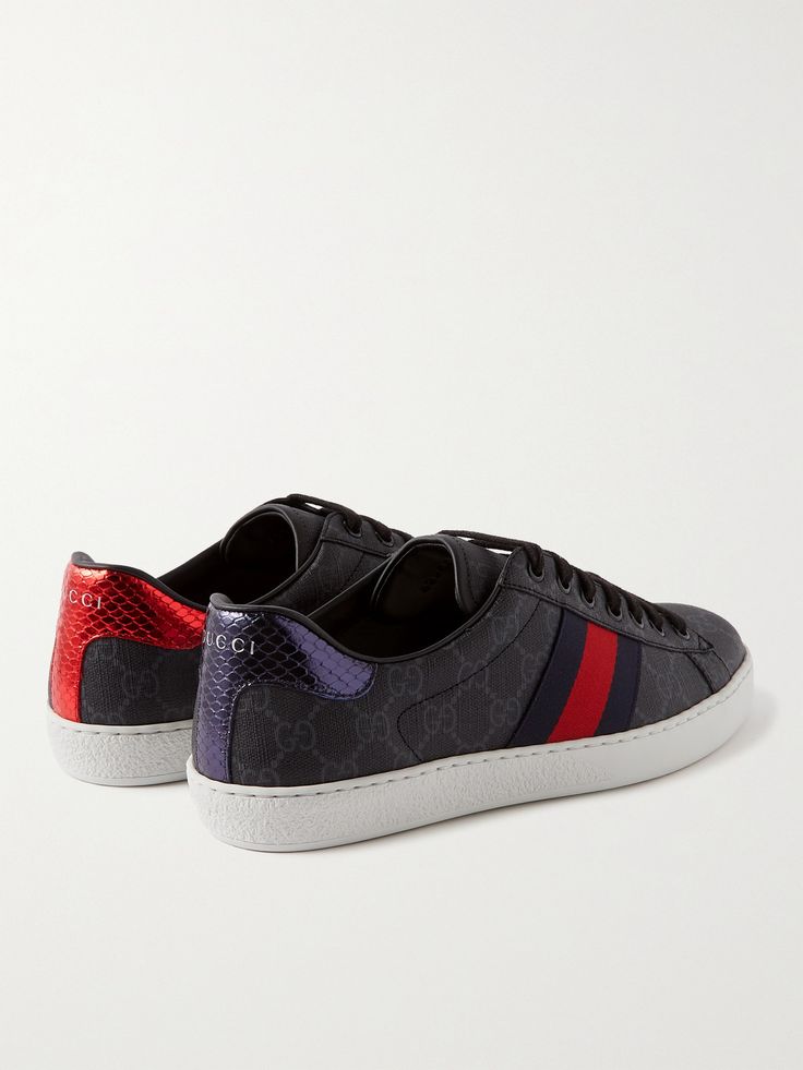 Alessandro Michele subtly reworks Gucci's 'Ace' sneakers each season. This pair has been made in Italy from canvas woven with the house's 'GG Supreme' monogram and trimmed with leather and metallic snake-effect heel tabs in contrasting blue and red. Gucci Collection, Gucci Shoes Sneakers, Sneakers For Men, Metallic Blue, Gucci Shoes, Canvas Sneakers, Mr Porter, Sneakers Black, Top Sneakers