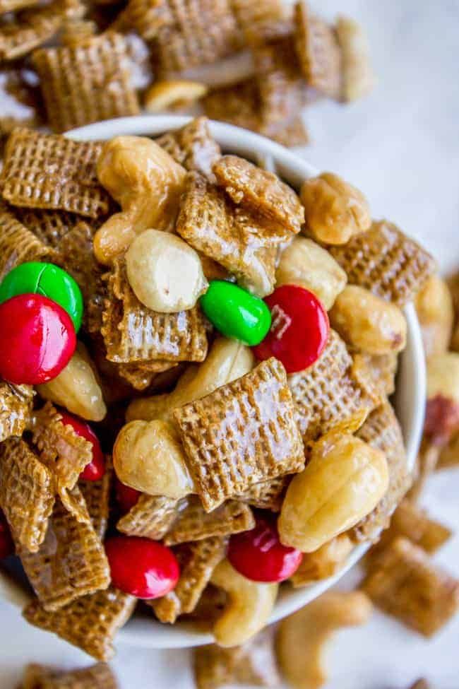 a white bowl filled with cheetos and candy