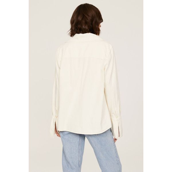 Off-white chambray (100% Cotton). Top. Long sleeves. Collar. Front button closure. 33.5" from shoulder to hemline. Imported. White Tops With Roll-up Sleeves For Everyday, White Collared Top With Roll-up Sleeves, Chic White Blouse With Roll-up Sleeves, Everyday White Tops With Roll-up Sleeves, Chic Everyday Blouse With Roll-up Sleeves, Spring Cotton Blouse With Fold Down Collar, Chic Fall Cotton Shirt, White Blouse With Rolled Sleeves For Work, Everyday Collared Blouse For Fall