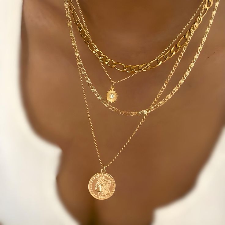 🌞 Layered Boho Necklace with Medallion - a boho dream come true! This gold coin pendant necklace adds vintage flair to any outfit, perfect for free-spirited, chic vibes. 🤍 Done 4 You: Stack of 4 necklaces already styled for you 🤍 Minimal Vibes: Simple stunning adding glow to all of your outfits 🤍 Vintage Charm: Hop on the vintage trend and make all heads turn  Enhance your outfit today & Glam up with this boho necklace!  #MedallionNecklace #BohoNecklace Size: 15"+16"+17"+18" necklaces 💸 Ref Layered Gold Chains Aesthetic, Dainty Coin Pendant Necklaces For Layering, Dainty Coin Pendant Necklace For Layering, Bohemian Charm Necklaces With Clavicle Chain, Bohemian Gold Charm Necklace With Clavicle Chain, Bohemian Clavicle Chain Charm Necklace, Bohemian Gold Coin Necklace With Round Pendant, Gold Bohemian Coin Pendant Necklace, Gold Bohemian Coin Necklace With Round Pendant