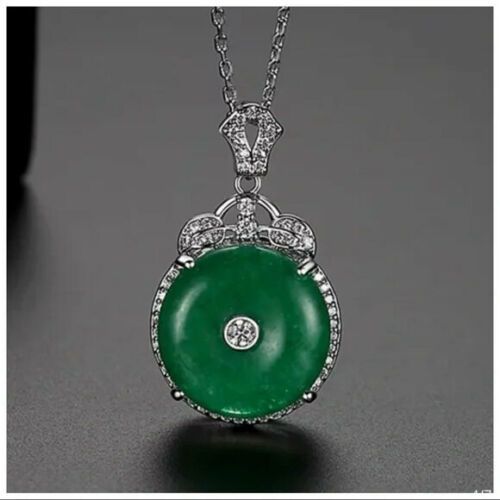 Made Using Swarovski Crystals The Cristyana Jade Green Crystal Necklace S8 | eBay Elegant Round Jade Crystal Necklaces, Elegant Jade Pendant Crystal Necklace, Elegant Jade Crystal Necklace As Gift, Elegant Jade Crystal Necklace For Gift, Exquisite Jade Necklaces For Gifts, Elegant Jade Necklaces For Gifts, Elegant Jade Necklaces As Gifts, Exquisite Jade Necklace Gift, Elegant Jade Necklace As Gift