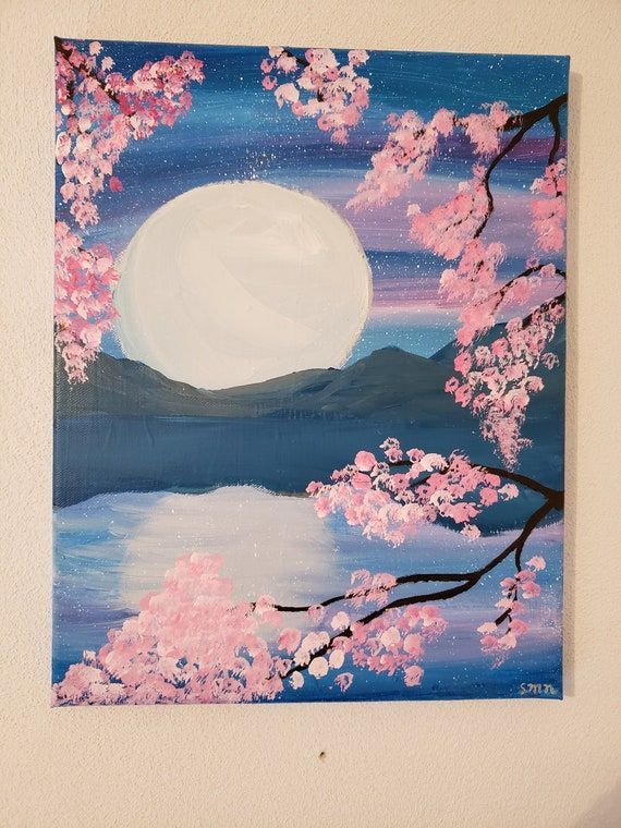 a painting of a full moon over a lake with cherry blossom trees in the foreground