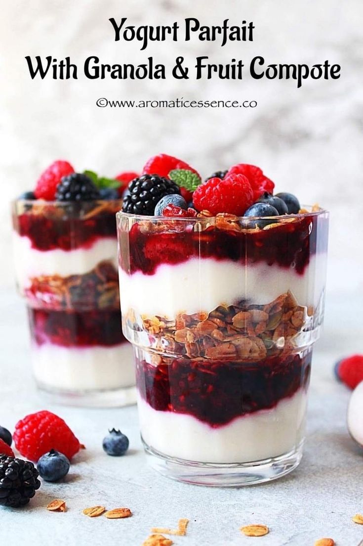 yogurt parfait with granola and fruit compote on a table