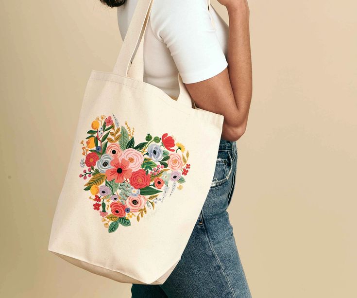 Featuring illustrated designs and a sturdy construction, our canvas tote bags are a pretty grab and go accessory for everything from school to daily errands. Painted Canvas Bags, Handpainted Tote Bags, Colorful Tote Bags, Handpainted Bags, Flowers Tote, Painted Hats, Painted Tote, Heart Canvas, Painted Bags