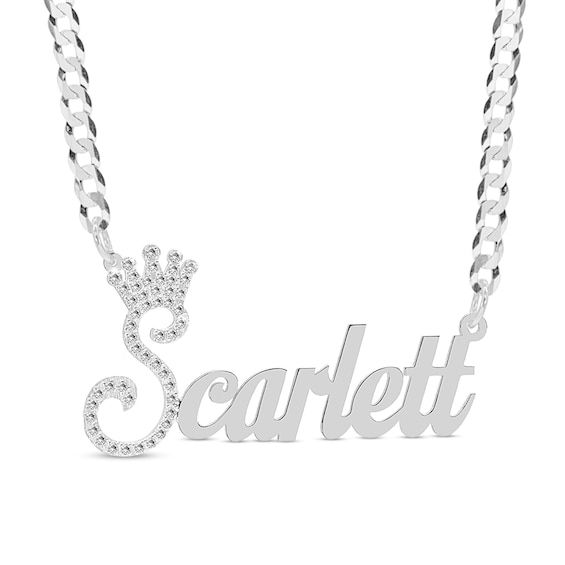 Make an expressive statement with this personalized CZ crowned name necklace. Made in responsibly sourced, nickel-free 925 sterling silver for everyday wear. Stone: Cubic Zirconia Stone Size: 1 mm Chain Length: 18 in. Chain Width: 3 mm Font: Script Character Limit: 3-10 Personalized Silver Cubic Zirconia Jewelry, Silver Custom Necklace With Diamond Accents For Anniversary, Custom Silver Necklace With Diamond Accents For Anniversary, Silver Jewelry With Diamond Accents For Birthday, Personalized Silver Diamond Name Necklace, Silver Nameplate Necklace With Diamond Accents, Silver Cubic Zirconia Nameplate Jewelry, Silver Engraved Diamond Custom Necklace, Custom Silver Diamond Necklace Engraved