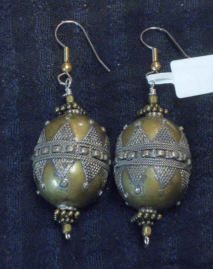 Afghani silver and gold wash bead  earrings. Length is 40mm Festive Drop Earrings With Gold Beads, Festive Costume Jewelry Metal Earrings, Festive Metal Costume Jewelry Earrings, Festive Metal Costume Earrings, Festive Earrings With Gold Beads, Gold Elegant Beaded Earrings With Large Beads, Elegant Gold Beaded Earrings With Large Beads, Festive Costume Jewelry Dangle Earrings, Festive Round Costume Jewelry Earrings