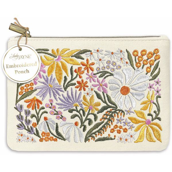 an embroidered pouch with flowers on it and a tag hanging from the front, in white