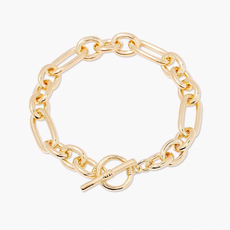 Feel beautiful wearing our Monroe Toggle Bracelet, crafted from a luxe link chain with an easy toggle closure. Dare to stand out wearing the perfect balance of contemporary and classic style in gold. Make the Monroe Toggle Bracelet your signature accessory and be surprised by the endless compliments you receive. Dare to shine with Monroe. Available in 14k gold plated brass 7" link chain 1/2" toggle closure SKU: BYB1171 Trendy Chain Bracelet With Toggle Clasp, Chic Metal Paperclip Bracelet With Adjustable Chain, Everyday Metal Bracelets With Toggle Clasp, Adjustable Oval Link Chain Bracelet With Toggle Clasp, Oval Link Chain Bracelet With Toggle Clasp, Metal Chain Bracelet With Toggle Clasp And Rectangular Links, Metal Chain Bracelet With Rectangular Links And Toggle Clasp, Everyday Metal Chain Bracelet With Toggle Clasp, Modern Chain Bracelet With Toggle Clasp For Everyday