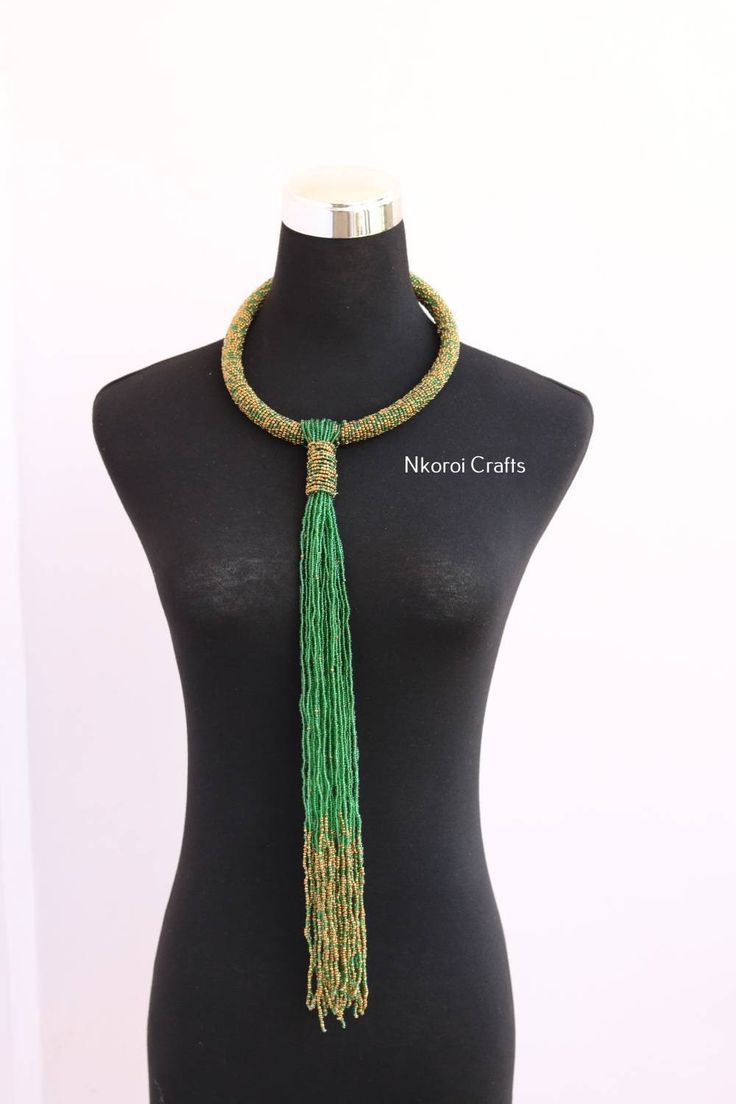 Beaded tie necklace, African pendant necklace, One size fits all, Beaded women jewelry, Christmas gift for her, Moms gift, Boho necklace An elegant necklace that can match any outfit. Available in different colors Color:Dark green Handmade by the Maasai women in Kenya using fine beads. 3-5 days delivery via DHL Express. Pay shipping fee for the first item only and additional items ship for free. To view more items in our shop, kindly click here: nkoroicrafts.etsy.com Adjustable Green Beaded Lariat Necklace, Colorful Beads Lariat Necklace Gift, Colorful Beads Lariat Necklace For Gift, Adjustable Lariat Necklace With Colorful Beads For Gift, Handmade Green Beaded Lariat Necklaces, Handmade Green Lariat Beaded Necklace, Adjustable Beaded Necklaces With Dangling Beads As A Gift, Adjustable Beaded Necklace With Dangling Beads For Gift, Beaded Chain Lariat Necklace As Gift