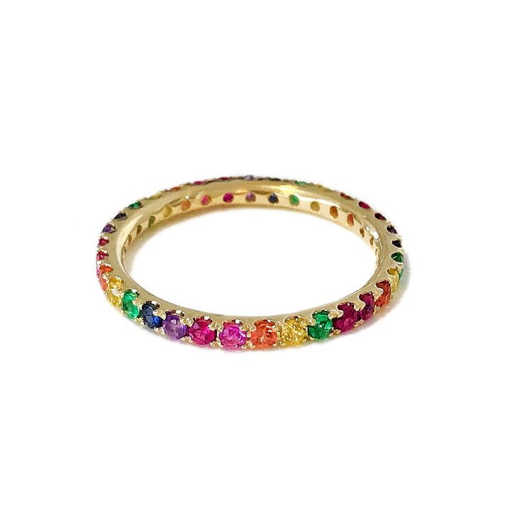 "This finely handcrafted ring is made completely of 14K solid gold and pavé set with genuine AAA quality round brilliant cut natural real rubies, pink sapphires, orange sapphires, yellow sapphires, blue sapphires, purple sapphires and emerald gemstones. Perfect for stacking. ♦ Band Width: approximately 2.3mm ♦ Metal Finish: High Shine Polish ♦ This design is available in Rose, White and Yellow 14K Gold; also in 14K White Gold with Black Rhodium Plated Finish ♦ Please note that this item takes ab 14k Gold Multi-stone Eternity Band, 14k Gold Round Rainbow Jewelry, 14k Gold Rainbow Jewelry, 14k Gold Multi-stone Eternity Band As Gift, Rainbow Colored Round 14k Gold Jewelry, Pave Setting Eternity Band Ring As Gift, Round Multi-stone Cubic Zirconia Eternity Band, Fine Jewelry Multi-stone Round Cut Eternity Band, Round Cubic Zirconia Eternity Band With Multi-stone