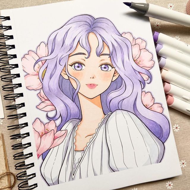 a drawing of a girl with purple hair and flowers on her head, next to some crayons