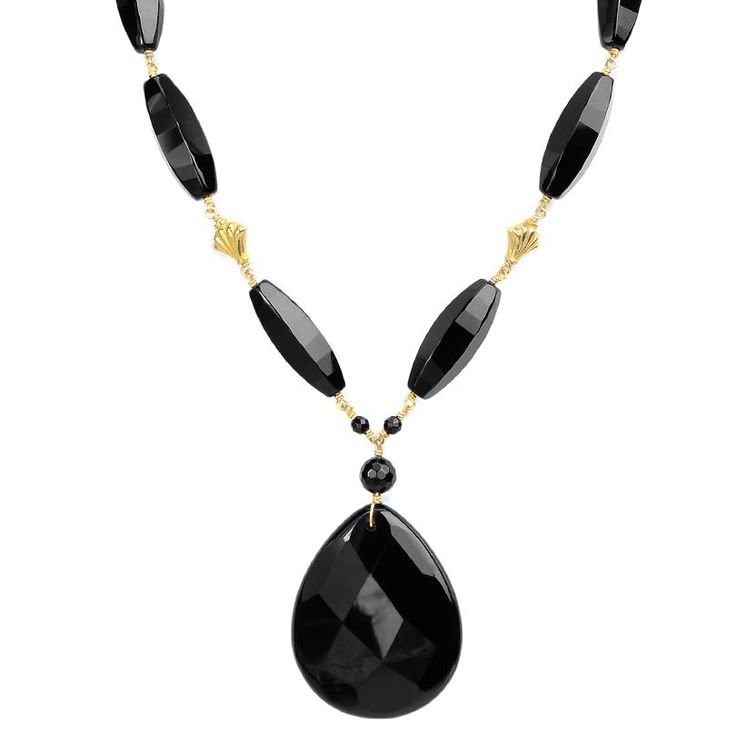 Hand Created Black Onyx Necklace with Gold AccentsNeckline is Composed of Beautifully Faceted Onyx Stones. Get some matching earrings BSER090716-01 or BSER101716-01 Stones: Onyx Length: Approx. 17"-19" Width: Large Drop is approx. 1 3/4" long and 1 1/2" wide Material: The fans are gold plated silver & the toggle is gold filled Made in: USA Luxury Black Necklace With Natural Stones, Luxury Onyx Jewelry With Faceted Beads, Luxury Statement Onyx Necklace, Black Onyx Necklace, Toggle Necklace, Onyx Necklace, Onyx Stone, Gold Plated Silver, Matching Earrings