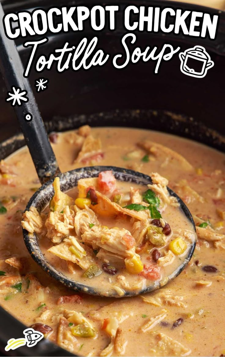 crockpot chicken tortilla soup in a black bowl with a ladle