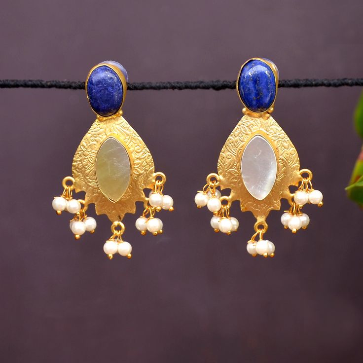 Fancy Party Wear Traditional Jhumki Earrings. Perfect with ethnic & traditional wear. Perfect gift for any occasion for yourself and your dear ones. These Earrings can be worn with all kind of Outfits. It is advisable to store jewellery in a zip lock pouch (air tight pouch), keep away from water perfume and other chemicals and clean it with dry and soft cloth. Festive Dual-tone Chandbalis, Festive Cutdana Chandelier Earrings, Festive Dual-tone Danglers, Temple Jewelry Danglers For Navratri Celebration, Navratri Wedding Drop Danglers Earrings, Festive Cutdana Chandelier Earrings For Celebration, Festive Dual-tone Danglers For Celebration, Festive Danglers With Latkans As A Gift, Festive Dual-tone Drop Jhumkas