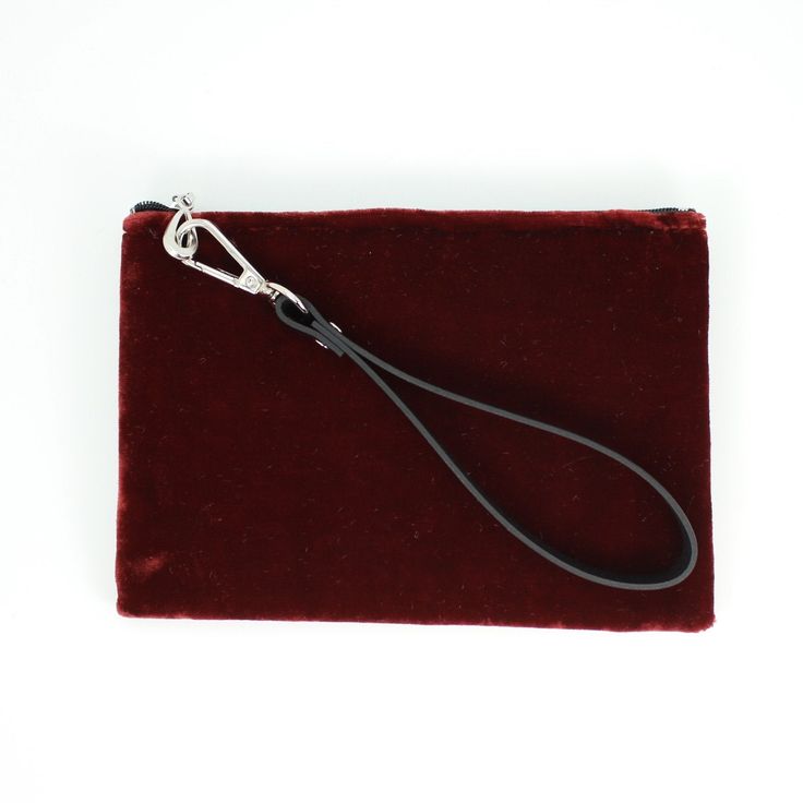 Solid colored silk velvet in the perfect wallet size, with an added detachable leather wristlet strap. Measures 7.5" x 5", Silk Velvet, Spot Clean. Handmade in Portland, Oregon. Evening Clutch With Wrist Strap, Formal Rectangular Clutch With Wrist Strap, Rectangular Clutch With Wrist Strap For Formal Events, Rectangular Clutch With Wrist Strap For Formal Occasions, Chic Zipper Pouch Wristlet, Elegant Formal Clutch With Wrist Strap, Chic Wristlet With Zipper Pouch, Chic Rectangular Wristlet With Zipper Pouch, Elegant Leather Clutch Wristlet