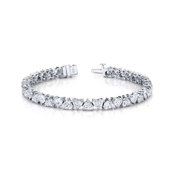 Heart shape diamond bracelet set in 18K white gold. 15.86 Total Carat Weight 38 Total Stones Heart Shaped Diamond Bracelet, Luxury Heart Cut Diamond Bracelet With Diamond Accents, Luxury Heart-shaped Tennis Bracelet As Gift, Heart Shape Bracelet, Diamond Bracelet Design, Jewelry Bracelets Gold, Men Bracelet, Bracelets Gold, Bracelet Design