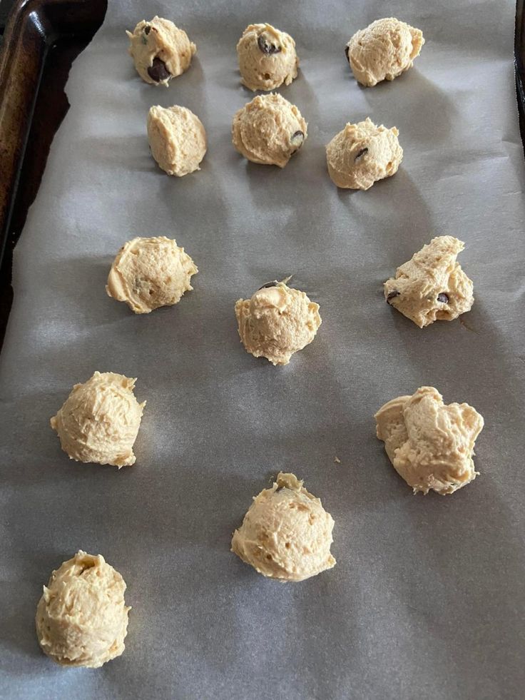 dough balls on a baking sheet ready to go into the oven