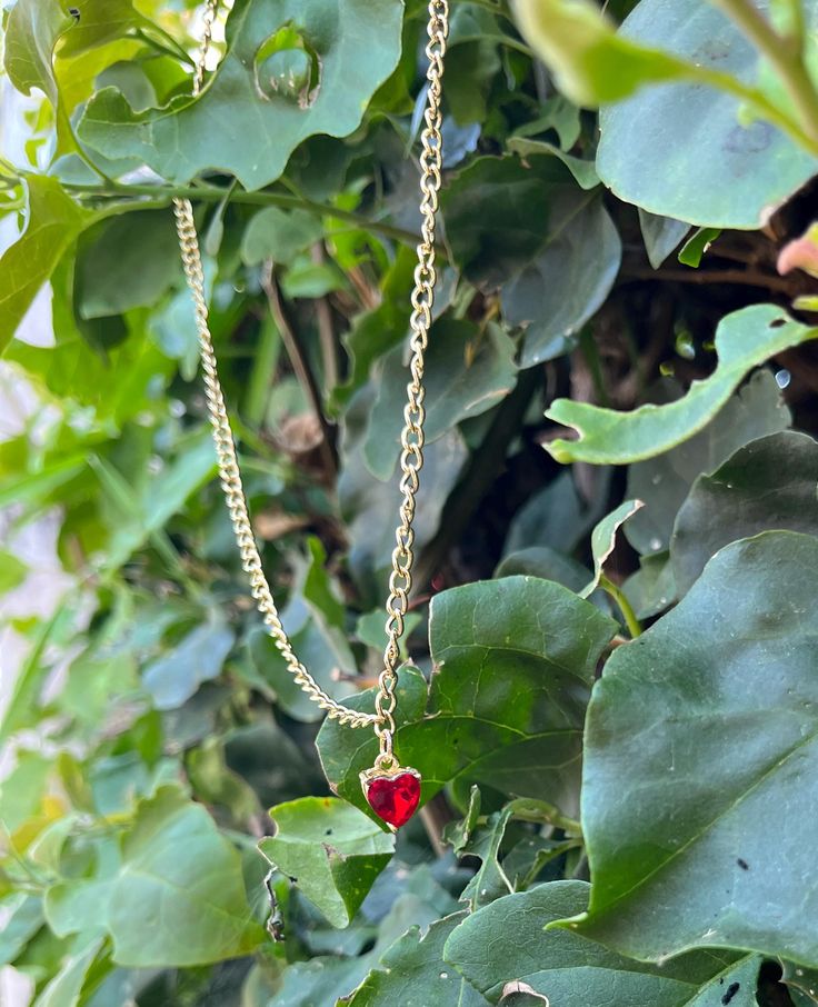 Pretty gold + red heart necklace Red Dainty Charm Necklace With Heart Charm, Red Heart Pendant Necklace With Clavicle Chain, Red Necklace For Valentine's Day, Red Pendant Necklace For Valentine's Day, Red Necklaces For Valentine's Day, Valentine's Day Gold Plated Pendant Necklace, Dainty Red Charm Necklace For Valentine's Day, Red Heart Clavicle Chain Necklace, Dainty Red Heart Charm Necklace