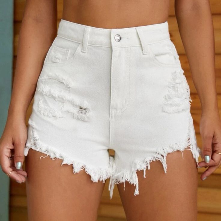 Ripped Raw Hemmed Demon White Shorts. Straight Leg. Zipper Fly. High Waisted. Regular Fit. Regular Stretch. Large (Size 8/10) White Cutoff Shorts Outfit, White Jeans Shorts, White High Waist Ripped Bottoms, High Waist Ripped White Bottoms, White High-waisted Ripped Bottoms, High-waisted White Ripped Bottoms, Ripped High Waist Shorts For Beach, High Waist Ripped Shorts For Beach, White Distressed High Waist Bottoms