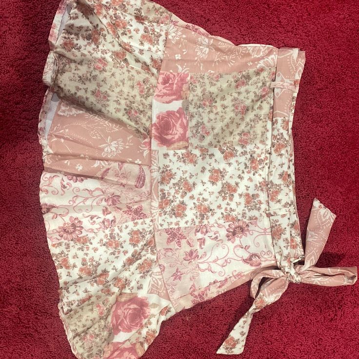 Brand New Never Worn With Tags, Cute Pink Multi-Patterned Skirt With A Side Zipper And Belt That Ties On Side. Cider Size Medium Trendy Summer Patchwork Skirt, Trendy Patchwork Summer Skirt, Trendy Patchwork Skirt For Summer, Summer Patchwork Mini Skirt, Casual Pink Patchwork Skirt, Cute Cotton Skirt With Floral Print, Fitted Patchwork Mini Skirt For Summer, Casual Patchwork Mini Skirt For Summer, Summer Patterned Mini Skirt