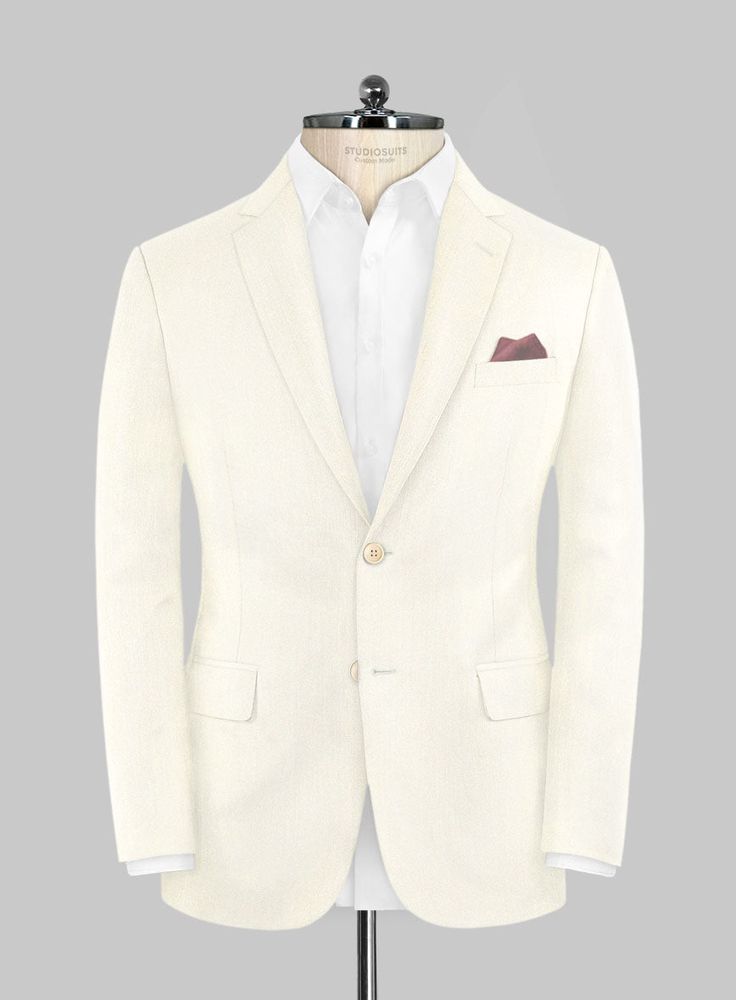 Make a simple yet sophisticated statement with our Napolean Ivory Wool suit. Crafted from wool blend, a perfect statement piece for any man who wants to look masculine and ideal at the same time. Combine it with a matching waistcoat, a crisp white shirt, patterned brown tie and dark brown dress shoes to complete the look.  Look Includes   Napolean Ivory Wool Fabric  Two Button Jacket Style  Notch Lapel  Corozo Beige Buttons  Single Vent  Three Cuff Buttons  Two Welted Back Pockets on Trousers    Click 'Customize Now' to modify the look if needed.   Lining: Viscose, Dry Clean, Pants can be lightly washed. Dark Brown Dress Shoes, Grey Tweed Suit, Dark Brown Dress, Herringbone Tweed Jacket, White Linen Suit, Green Velvet Jacket, Peaky Blinders Suit, Grey Wool Suit, Royal Blue Suit