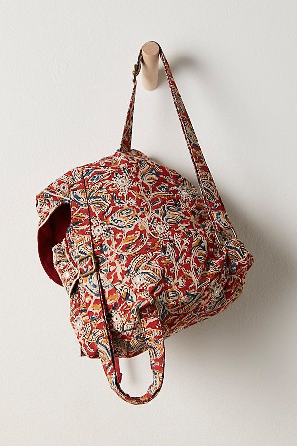 Add the most stunning touch to your bag collection with this slouchy, soft backpack featured in a colorful, printed design with embroidery, mirrored detailing, and defined pockets for a true utility-inspired touch. * Flap top closure * Printed, quilted fabrication * Defined pockets at front * Interior zip pocket * Adjustable shoulder straps | Mia Mirrored Backpack Bag by Free People Bag Collection, Backpack Bag, Boho Clothing, Printed Design, You Bag, Boho Outfits, Backpack Bags, Shoulder Straps, Zip Pockets