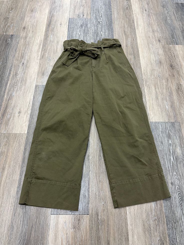 Brand: KUT Style: PANTS CHINOS & KHAKIS Color: OLIVE Size: 4 SKU: 137-13714-233554 CONDITION: GENTLY USED High Waist Olive Bottoms For Work, High Waist Olive Cotton Pants, Olive High-waisted Bottoms With Pockets, Olive High-waisted Pants For Spring, Green Wide Leg Cotton Bottoms, Olive Straight Leg Summer Bottoms, Green High-waisted Cotton Bottoms, Green Cotton High-waisted Pants, Casual Green Bottoms For Workwear