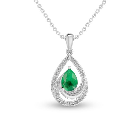 A sophisticated look with stylish details, this attractive fashion pendant elevates your attire. Crafted in sterling silver This design showcases a 7.0 x 5.0mm pear-shaped verdant-green lab-created emerald at the center. Shimmering white lab-created sapphires glisten along the teardrop-shaped swirling frame. This pendant suspends along an 18.0-inch diamond-cut cable chain, with an additional closure ring at 16.0 inches, that secures with a lobster claw clasp. Diamond Pendant Necklace Zales, Pear Shape Emerald Pendant, Pear Shape Necklace, Elegant Sterling Silver Teardrop Pendant Jewelry, Elegant Teardrop Sterling Silver Necklace, Elegant Drop Jewelry With May Birthstone, Elegant Drop Jewelry For May Birthstone, Elegant Sterling Silver Necklace With May Birthstone, Elegant Teardrop Pendant Necklace With Polished Finish