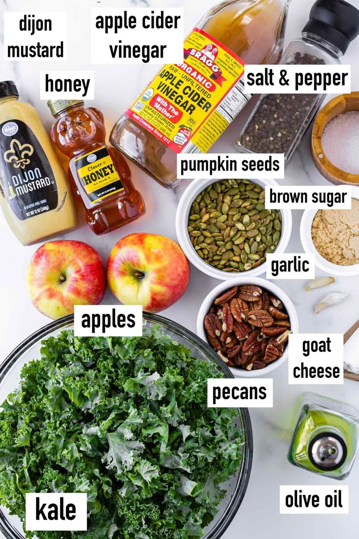 the ingredients to make apple cider vinegar salad are shown on a white table top