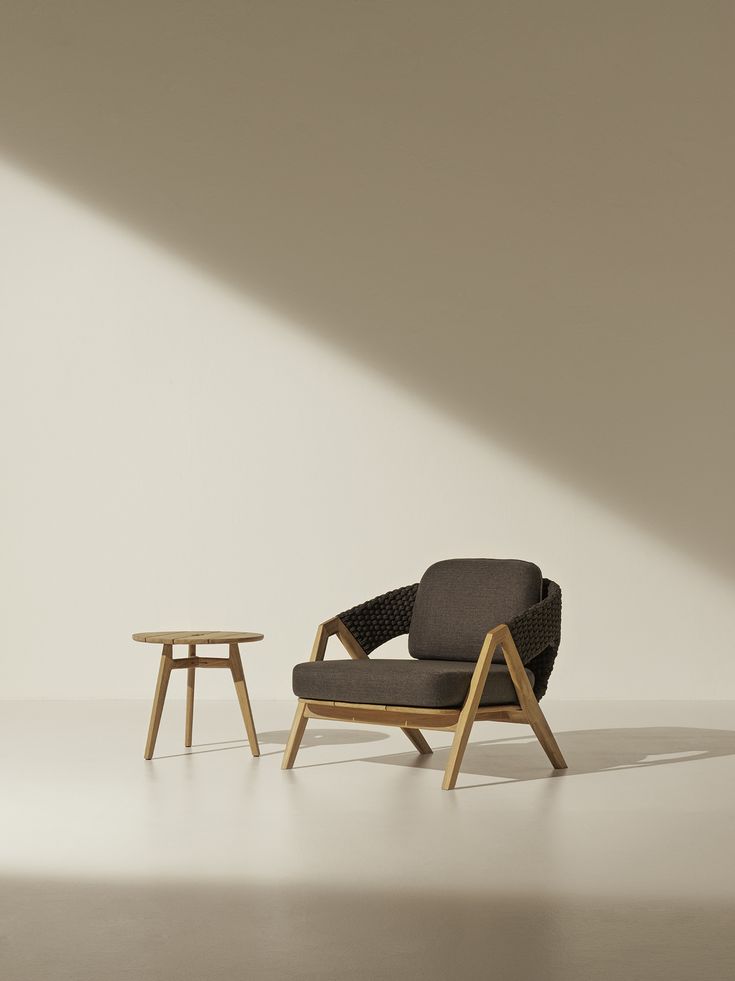 a chair and table in an empty room