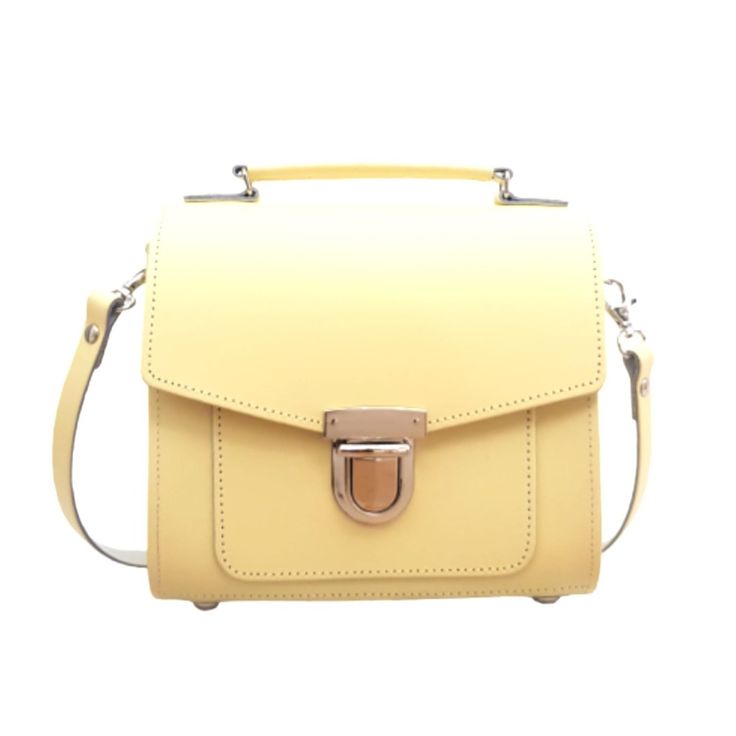 This classic leather sugarcube bag is carefully handmade out of real leather in England. This cute collection of colourful sugarcube bags will fit any occasion and complement your look. Our latest colour, Primrose Yellow.  Trendy shape with a push lock closing and little handle makes it a perfect bag to complement your favourite outfit. The strap is adjustable and detachable allowing the bag to be worn on your shoulder, cross body or carried as a clutch. RRP £90 Handmade in England. Lifetime Gua Classic Yellow Rectangular Satchel, Yellow Leather Rectangular Flap Bag, Yellow Rectangular Leather Flap Bag, Yellow Square Box Bag For Everyday, Square Leather Flap Bag As A Gift, Everyday Yellow Square Satchel, Leather Bag Outfit, Yellow Leather Bag, Primrose Yellow