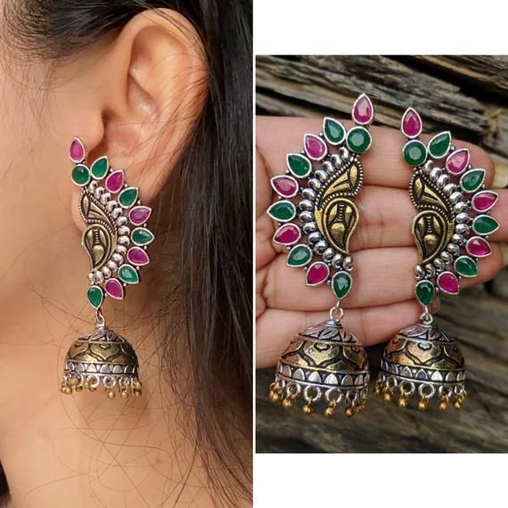 Add charm and charisma to your beautiful personality with these exquisitely designed and handcrafted high quality dual tone Brass  earrings studded with real AD stonesPair them up with any formal or semi formal attire and gather compliments all the way. The earrings are light weight so can be worn comfortably even for longer hours.Weight 42 GM'sLength 3 inches****************************************Note: All in stock items will be shipped from New Delhi, India within 2-3 business days after rece Beautiful Personality, Semi Formal Attire, Traditional Indian Jewellery, Celebrity Jewelry, New Delhi India, Traditional Earrings, Jewelry Fashion Trends, Ethnic Earrings, Fancy Jewelry