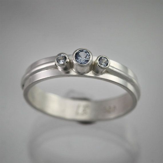 , $60.00 Modern Sterling Silver Stackable Rings With Tension Setting, Modern Sterling Silver Birthstone Ring For Wedding, Modern Birthstone Ring With Polished Finish, Modern Silver Birthstone Ring, Modern Hand Forged Silver Stackable Rings, Modern Topaz Promise Ring, Modern Silver Stackable Rings With Gemstones, Modern Silver Birthstone Ring For Wedding, Modern Sterling Silver Hand Forged Stackable Rings