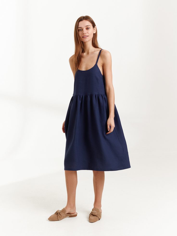 "DULCE is a linen strappy dress. DETAILS - Spaghetti straps - Below the knee length - Smock silhouette - Pockets - 100% lightweight European linen fabric - Cut and sewn to order just for you in our studio COLOR - Navy Blue, you can also choose other colors above - Fabric samples are available here https://www.etsy.com/listing/586569696/linen-fabric-samples SIZING & FIT - Fits true to size - Measurements taken from a size XS - Model is 5'8.9\" / 175cm and wearing a size XS CARE FOR LINEN - Ma Summer A-line Midi Dress With Straps, Summer Knee-length Suspender Dress With Adjustable Straps, Chic Linen Sundress With Adjustable Straps, Blue Midi Length Suspender Dress For Summer, Blue Midi Suspender Dress For Summer, Casual Strap Dresses For Daywear, Linen Sundress With Adjustable Straps For Summer, Sleeveless Linen Dress With Adjustable Straps For Brunch, Summer Dress With Spaghetti Straps Unlined