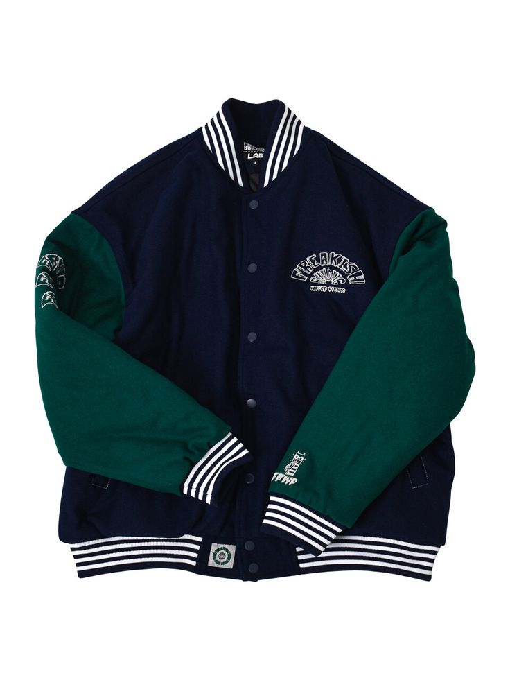 Editor's Notes Featuring various embroidered logo graphics, this casual varsity jacket is made from wool-blend with lightly padded lining for warmth. It's constructed with classic color-blocking body and sleeves with sporty striped ribbed edges.- Snap button fastenings- Two front welt pockets- Logo embroidery on the chest, sleeve and back- Logo labels on the hem and back- Striped ribbed edges- Drop shoulder- Relaxed fitMeasurements (in.) 2 / 3- Total Length: 26.0 in. / 27.2 in. - Shoulder: 22.8 in. / 24.4 in.- Chest: 25.2 in. / 26.8 in.- Sleeve Length: 22.8 in. / 23.6 in.Model info: 5' 11.7, 132.3 lbs / Fitting size 3Composition & Care- Shell: 50% Acrylic, 50% Wool- Lining: 100% Polyester- Filling: 100% Polyester- Dry clean only- Refer to the care labelDesigner- by FREAKISH BUILDING Retro Varsity Jacket With Contrast Color For College, Fall Varsity Jacket With Baseball Collar And Contrast Color, Winter Varsity Jacket With Patchwork And Baseball Collar, Varsity Style Long Sleeve Outerwear With Contrast Color, Winter Outerwear With Letter Embroidery And Baseball Collar, Collegiate Team-colored Outerwear For College, College Cotton Outerwear With Contrast Color, Sporty Varsity Jacket For Fall Campus, Sporty Fall Varsity Jacket