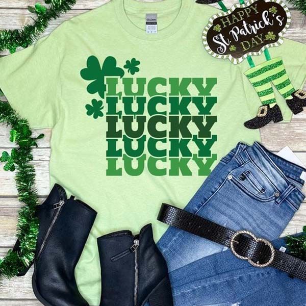 You'll be sure to not get pinched in this lucky St. Patrick's Day graphic tee! Come check out our website today! Fun Green Tops With Letter Print, Cute Green Top With Text Print, Green Short Sleeve T-shirt For St. Patrick's Day, Fun Green Tops With Text Print, Fun Green Top With Text Print, Green Crew Neck Tops For St. Patrick's Day, Trendy Green Slogan T-shirt, Trendy Green T-shirt With Slogan, Green Cotton T-shirt For St. Patrick's Day