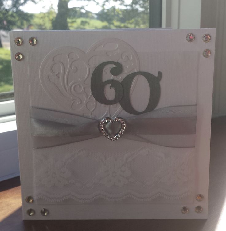 a wedding card with the number 60 on it