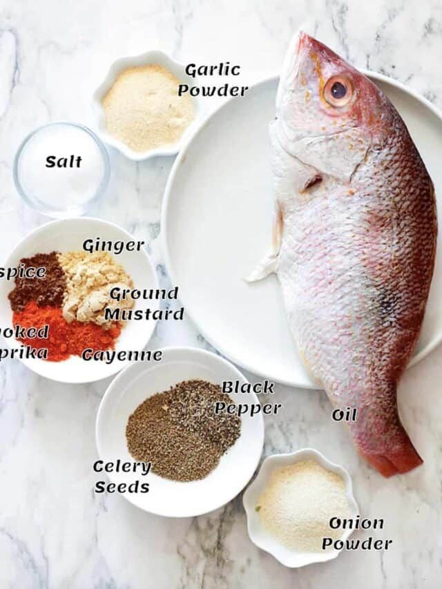 the ingredients for fish seasoning on a white plate