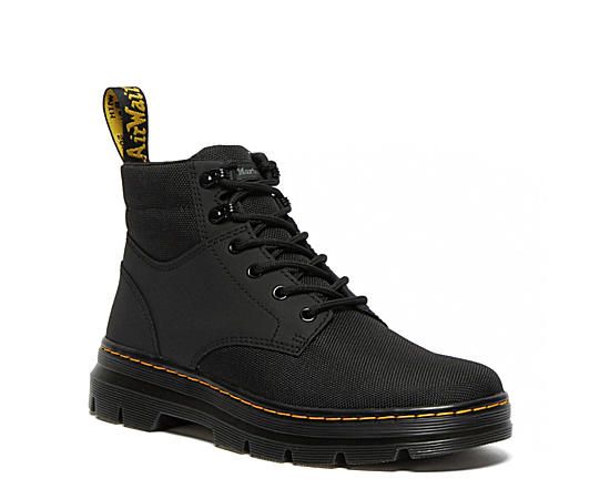 Dr. Martens Rakim Extra Tuff Mens Boot sA cool mix of ‘90s street fashion and sporty hiker, this Dr. Martens Rakim Extra Tuff mens Boot is rugged yet stylish. The tough leather upper holds up for the long haul and the Cushioned footbed keeps your feet comfortable. Cement welt construction ensures this Boot is sturdy and built for any adventure. Leather upper Lace-up closure Air- Cushioned footbedHeel pull-tabYellow stitching Rubber outsole Casual Lace-up Work Boots For Hiking, Sporty Low-top Work Boots For Streetwear, Sporty Streetwear Boots With Reinforced Toe, Casual High-top Work Boots For Outdoor Activities, Lace-up Boots With Rubber Toe Cap For Streetwear, Rugged Low-top Streetwear Boots, Rugged Low-top Boots For Streetwear, Casual Work Boots With Reinforced Toe For Hiking, Ankle-high Work Boots For Streetwear