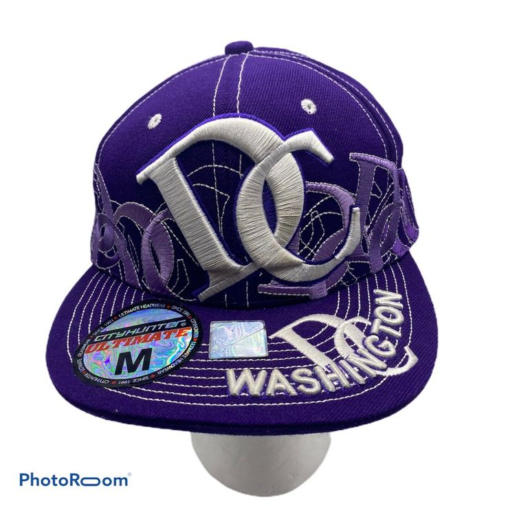 City Hunter Brand Washington DC Purple and white fitted baseball hat Medium Acrylic Curved Bill Hats For Baseball Season Streetwear, Hip Hop Fitted Hat For Baseball Season, Hip Hop Style Fitted Hat For Baseball Season, Fitted Hats For Streetwear, Fitted Baseball Cap For Streetwear, Casual Snapback Hat For Baseball Season, Streetwear Fitted Baseball Cap, Casual Snapback Hat With Flat Brim For Baseball Season, Casual Fitted Baseball Cap For Sports