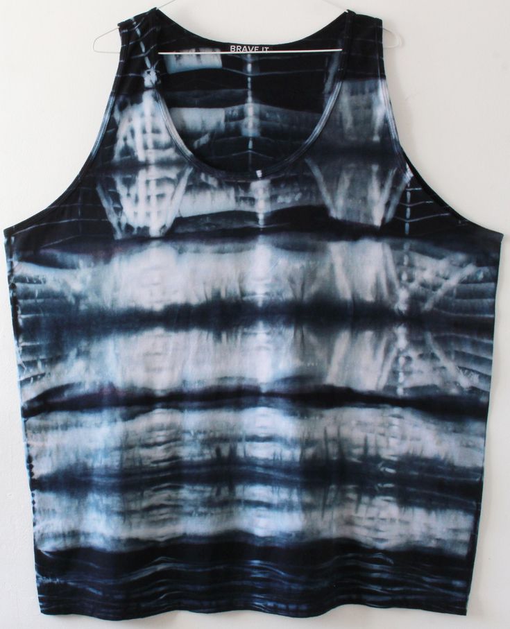 Black tie dye unisex XXL vest top. This top is 100% cotton. I use a tried and tested process so it should hold its colour well. Please hand wash first few times and then it should be fine to wash in the machine at no more than 40 degrees. This top is in a UK XXL size. This is in a Unisex big size and shipped from the UK. PLEASE SEE MEASUREMENTS IN SKETCH!  I deliver parcels via royal mail. For updates about how this delivery service is operating please see link: https://www.royalmail.com Festival Cotton Tank Vest, Acid Wash Cotton Tank Top For Festivals, Festival Acid Wash Cotton Tank Top, Tie-dye Cotton Tank Top, Cotton Tie-dye Tank Top For Festival, Tie Dye Cotton Tank Top, Acid Wash Hand-dyed Sleeveless Top, Cotton Tie Dye Tank Top For Festivals, Acid Wash Hand Dyed Sleeveless Top