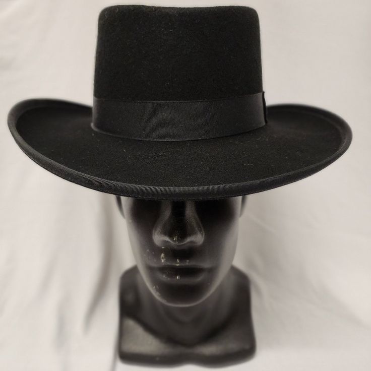 Excellent Quality Low Crowned Wool Felt With Satin Band. Brim: 3" Height: 4.5" Size: S, M, L, Xl 2xl Color: Black Size Guide: American / Nearest 1/8 Inch / Metric Cm / Size Code 6 3/4 21 1/8 54 Small 6 7/8 21 1/2 55 Small / Child L 7 21 7/8 56 Medium 7 1/8 22 1/4 57 Medium 7 1/4 22 5/8 58 Large 7 3/8 23 59 Large 7 1/2 23 1/2 Black Mini Hat With Curved Brim, Black Hat Bands For Kentucky Derby With Curved Brim, Adjustable Black Top Hat For Winter, Classic Winter Fedora Mini Hat, Black Curved Brim Hat For Kentucky Derby, Black High Crown Felt Hat For Winter, Classic Adjustable Costume Hats For Kentucky Derby, Winter High Crown Black Felt Hat, Rodeo Top Hat With Short Brim