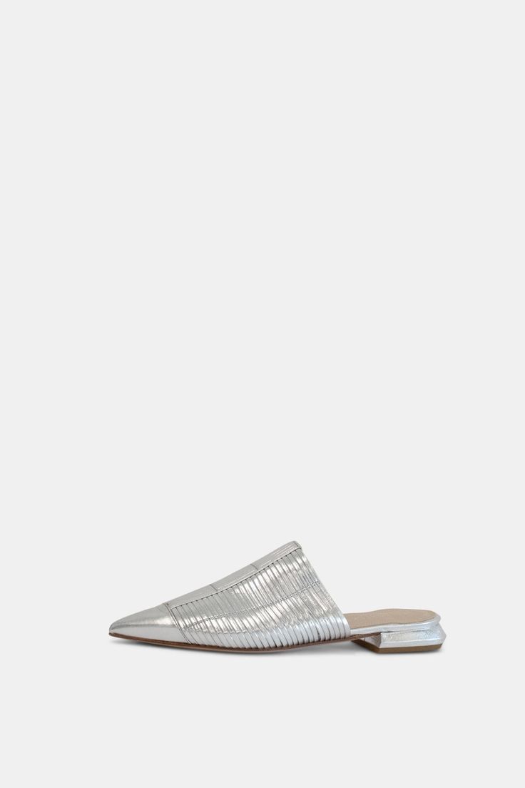 Strippy leather pointy toe mule in silver Silver Slip-on Mules For Party, Silver Slip-on Party Mules, Silver Pointed Toe Mules For Summer, Summer Silver Pointed Toe Mules, Silver Leather Mules For Party, Metallic Mules For Spring Evening Occasions, Metallic Mules For Spring Evening, Metallic Mules For Evening Spring Occasions, Chic Silver Leather Mules