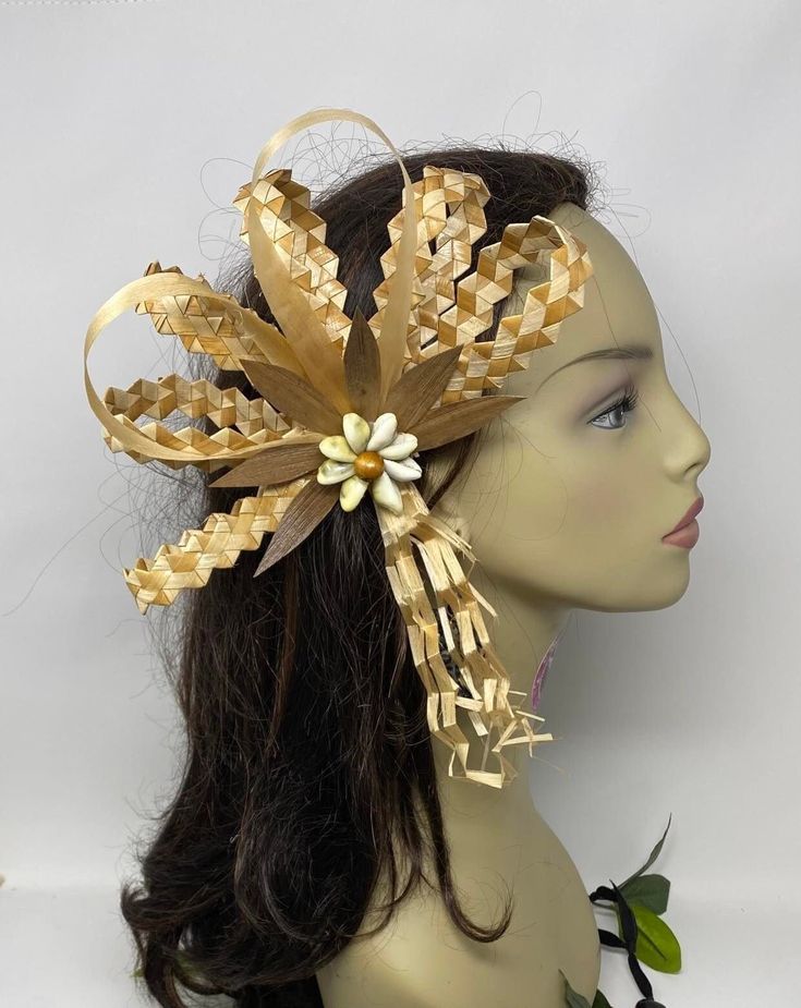 Our Huahine Hair clip is adored by Our Cook Islands & Tahitian dancers. Our costumes are made to order only. This is a simple piece especially for the young girls if they just want something simple for their first time solo. Huahine Hair Clip features all natural fibers, woven lauhala, hau grass, hala leaves and sea shell.   Dancers usually wear to the side but You can wear the clip the way want to wear it too. Please let me know if you want me to add a band instead of the clip for the dancers. NOTE- The band will be a single Woven Ric Rac lauhala band the same as the woven ric rac lauhala on the flower. Please let me know if want to order bulk for your dance group. Polynesian Headpiece, Tahitian Headpiece, Starfish Hair Clip, Cook Island, Island Wear, Hawaiian Plumeria, Natural Diy, Ric Rac, Cook Islands